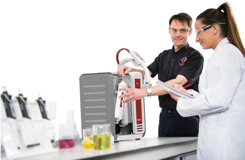 Duo and Technician Changing Prefilter and Scientist Writing.jpg